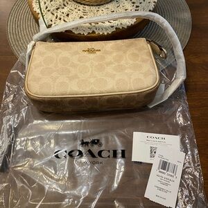 Coach Nolita 19 In Blocked Signature Canvas small bag